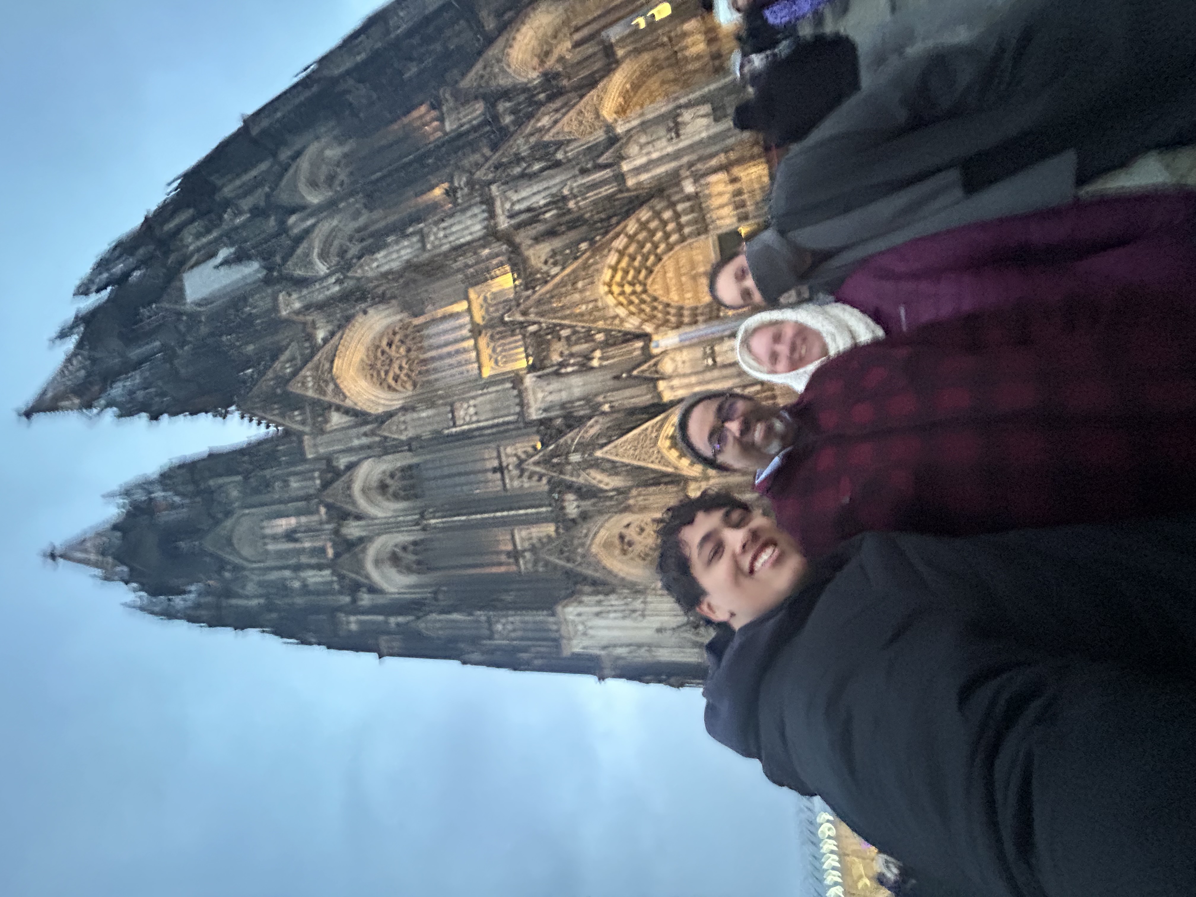 family picture in front of cathedral